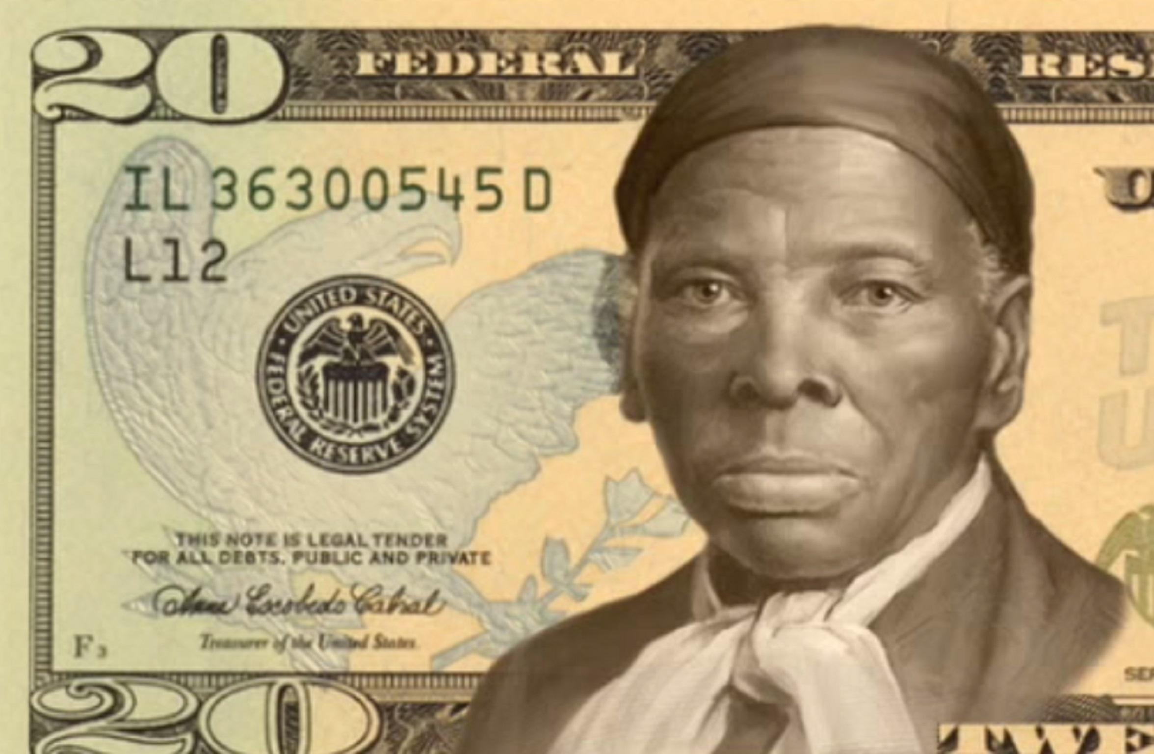 Harriet Tubman's face is superimposed on a 20-dollar bill.
