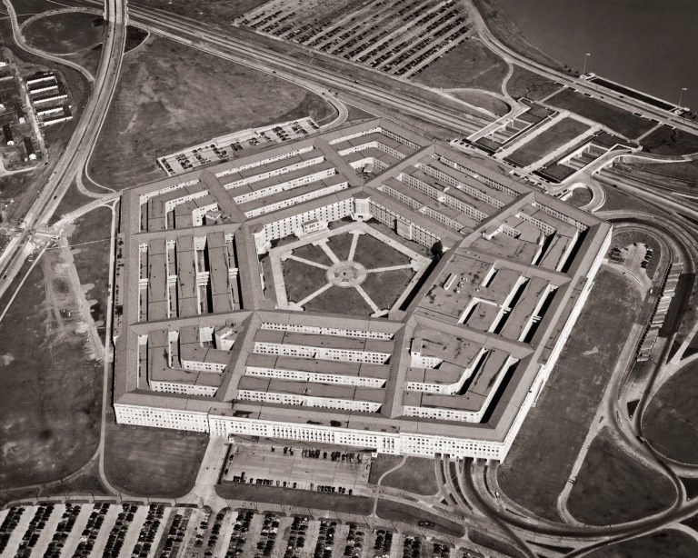 A black-and-white aerial view of the Pentagon in Washington, D.C.