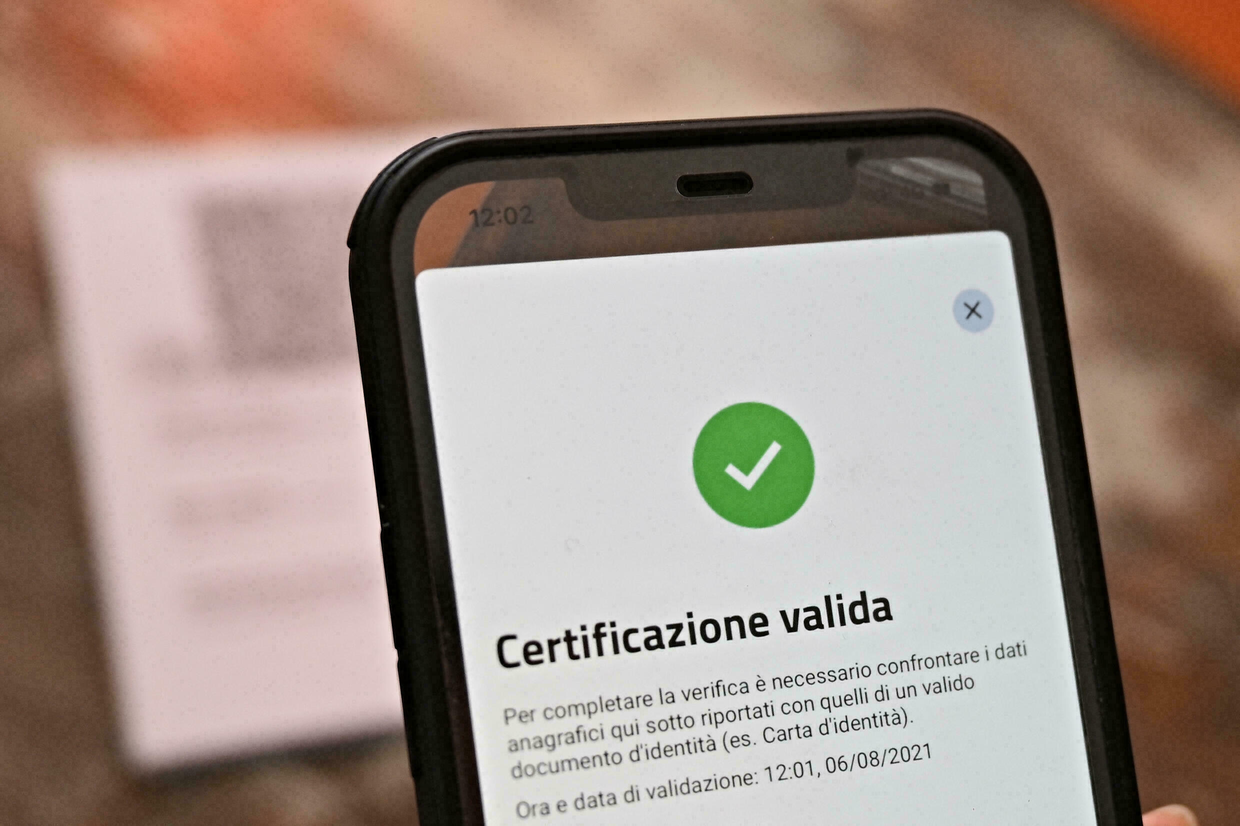 A smartphone screen showing the Italian green pass for Covid-19 vaccination.