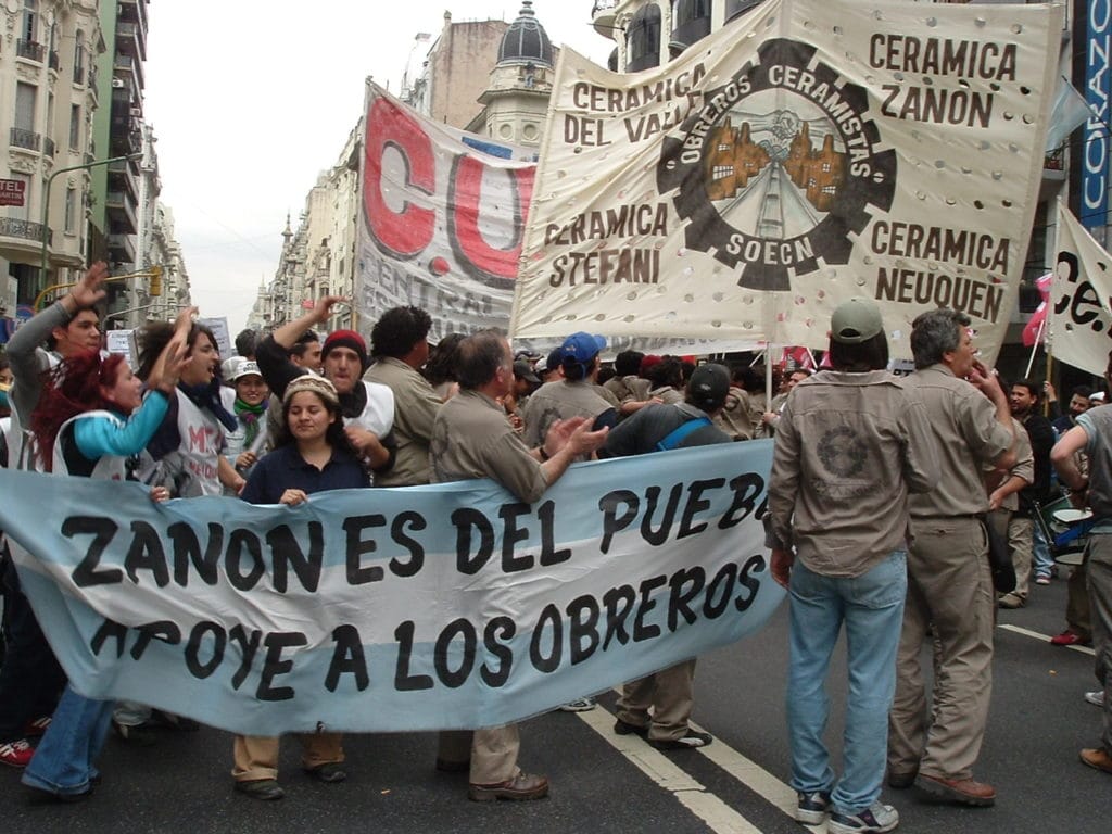 Marchers in Neuquen, Argentina carry a banner that demands the Zanon factory under worker control.
