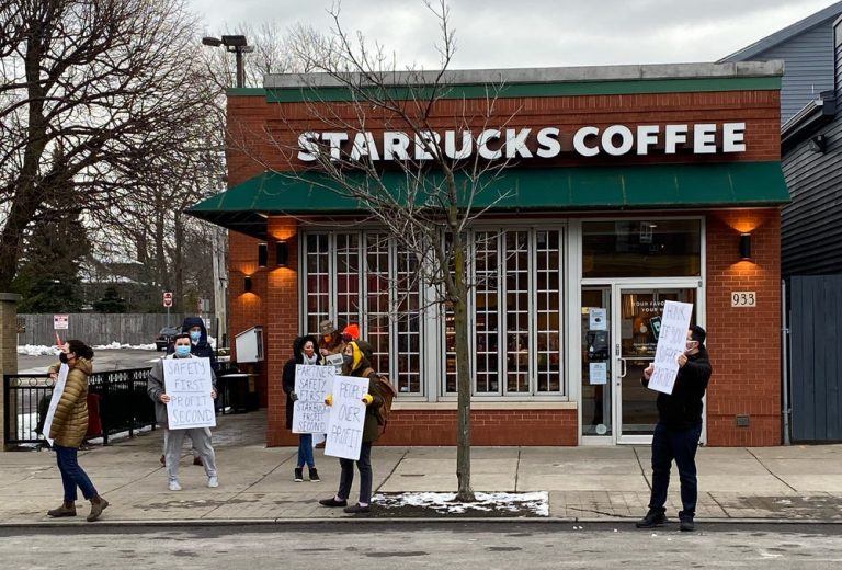 Starbucks workers protest in front of Buffalo store.