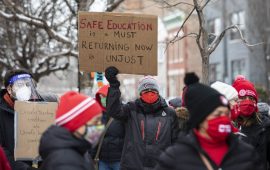 Chicago Teachers Union members and their supporters march and protest in Pilsen after a press conference outside Joseph Jungman Elementary School to call for “safety, equity and trust in any school reopening plan” on Martin Luther King Jr. Day, Monday morning, Jan. 18, 2021