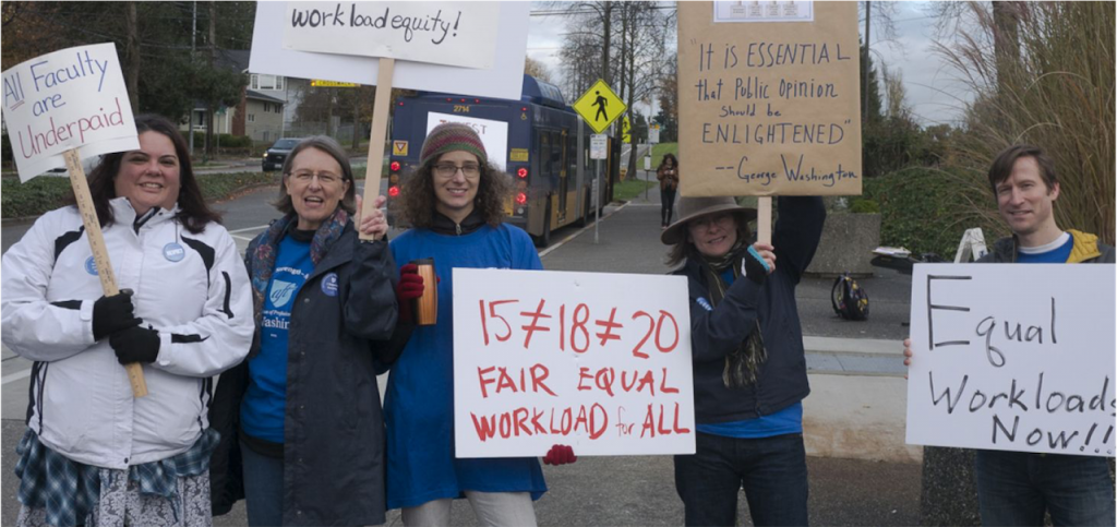 Seattle teachers hold signs at a rally on February 7 2022.