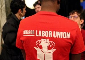 Jean-Michel Mutore (center), a former Amazon employee and supporter of the Amazon Labor Union, joins Amazon employees, union members and others in Brooklyn on April 1. Earlier that day, a majority of Amazon workers votes for the right to unionize.