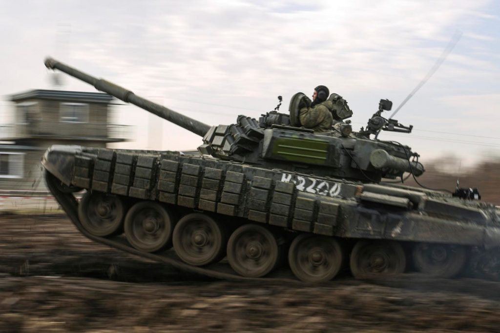 A Russian tank rolls during a military drills at Molkino training ground in the Krasnodar region.