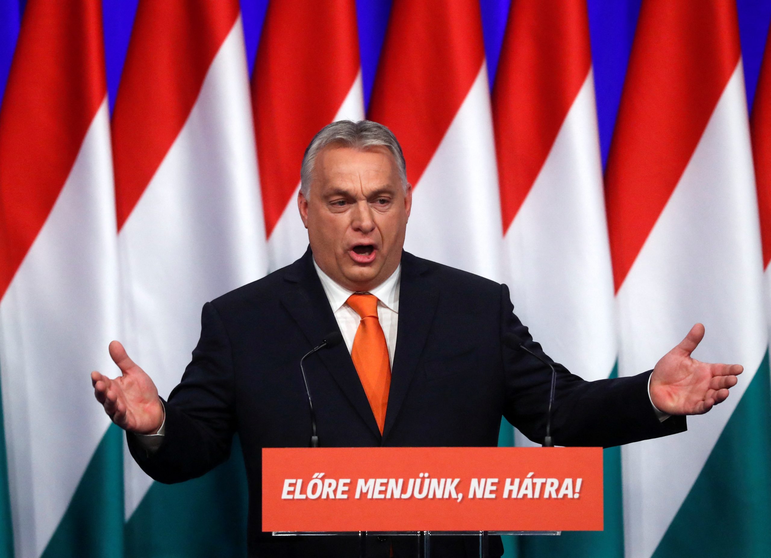 Hungarian Prime Minister Viktor Orban gestures as he delivers his annual state of the nation speech in Budapest, Hungary, February 12, 2022. Slogan reads "Let's go forwards, not backwards!".