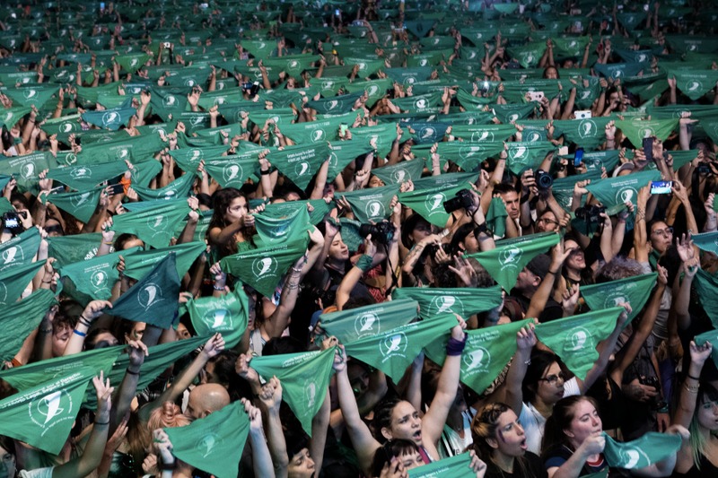 Argentinians hold green bandanas as part of the "Green Wave" for abortion rights