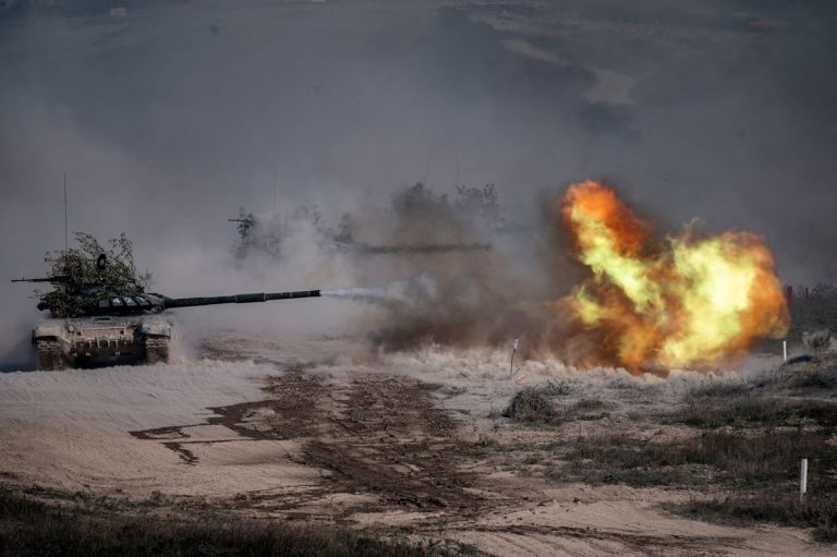 A tank firing in Ukraine during the Russian invasion.