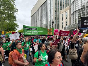 New York abortion rights protest. Demonstrators wear green.
