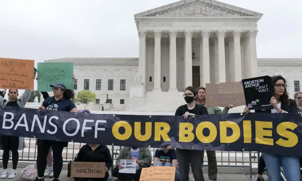 Demonstrators protest outside of the US supreme court on Tuesday.