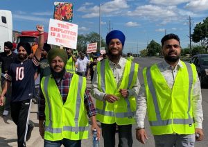 Naujawan Support Network members marched on Sukh Auto in May, demanding the owner pay a former worker the thousands he’s owed in wages and vacation pay