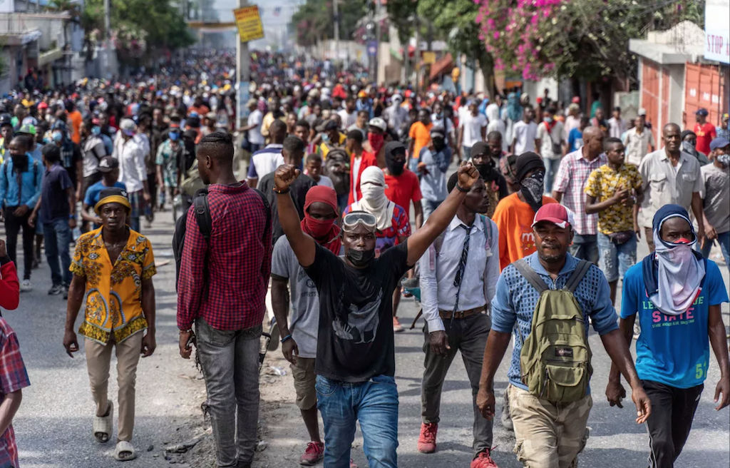 Demonstrators fill the streets during a protest to demand the resignation of Prime Minister Ariel Henry, in the Petion-Ville area of Port-au-Prince, Haiti, on Monday October 3.