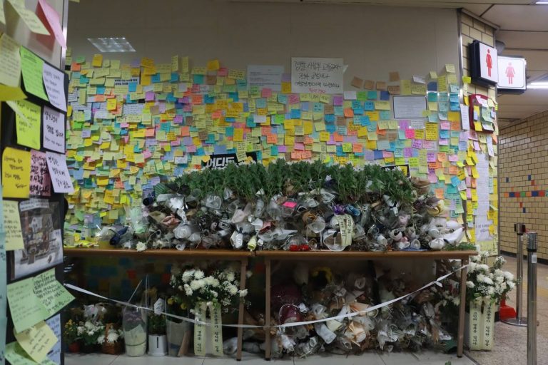 Vigil in South Korea against femicide (post-it notes on a wall)