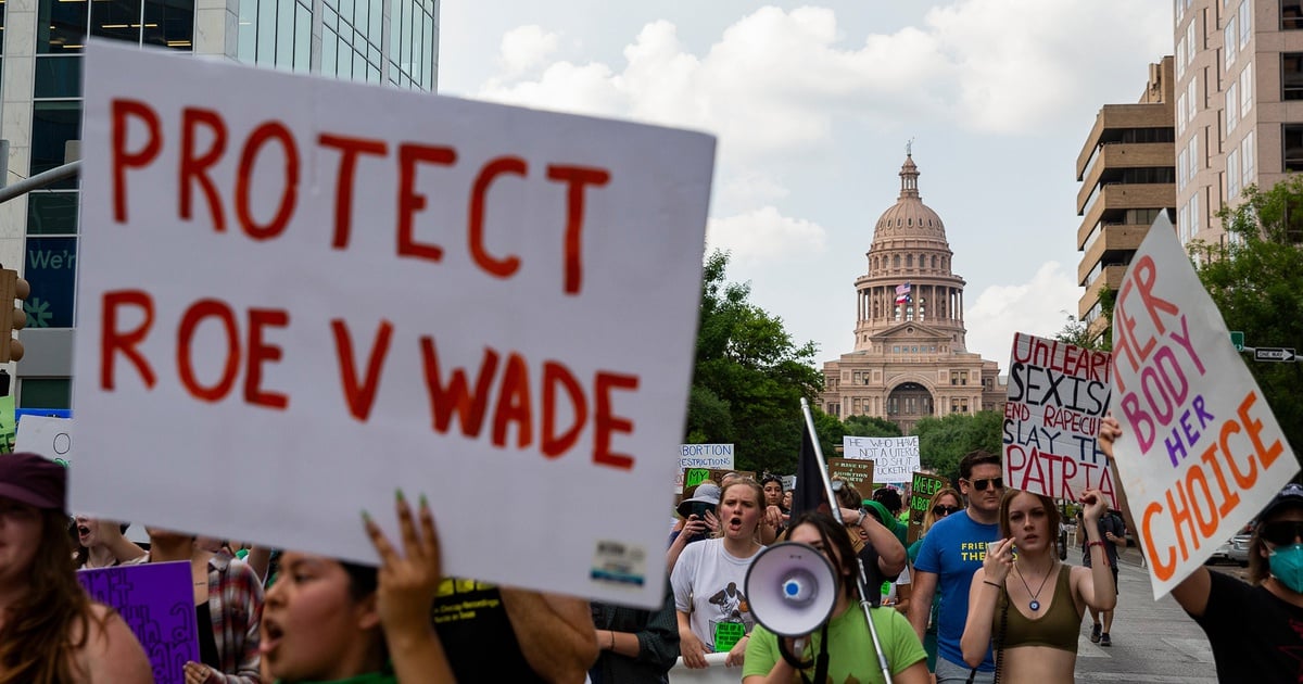 People rallying for abortion rights march down Congress Avenue in Austin on May 3, 2022