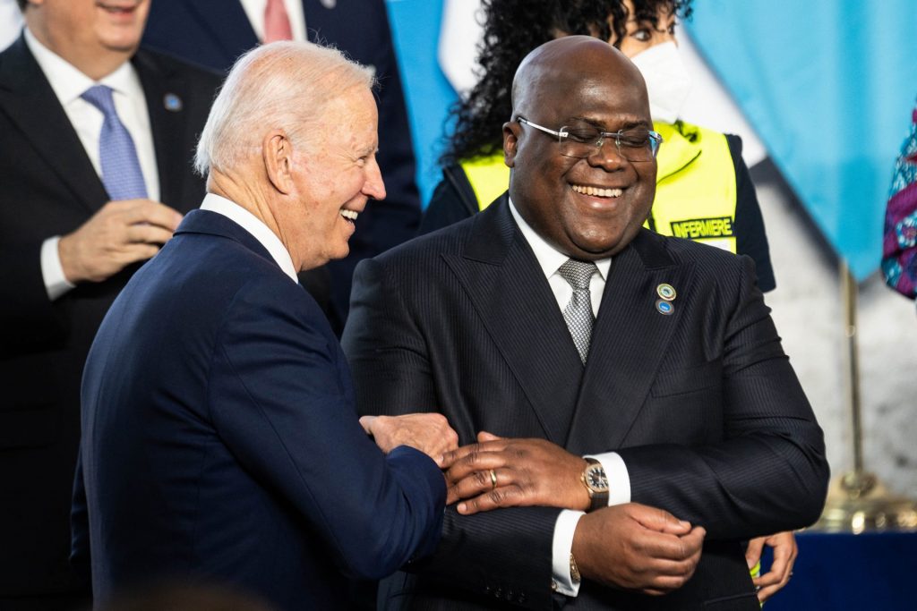 US President Joe Biden and DR Congo President Felix Tshisekedi joke during a group photo at the G20 of World Leaders Summit on October 30, 2021