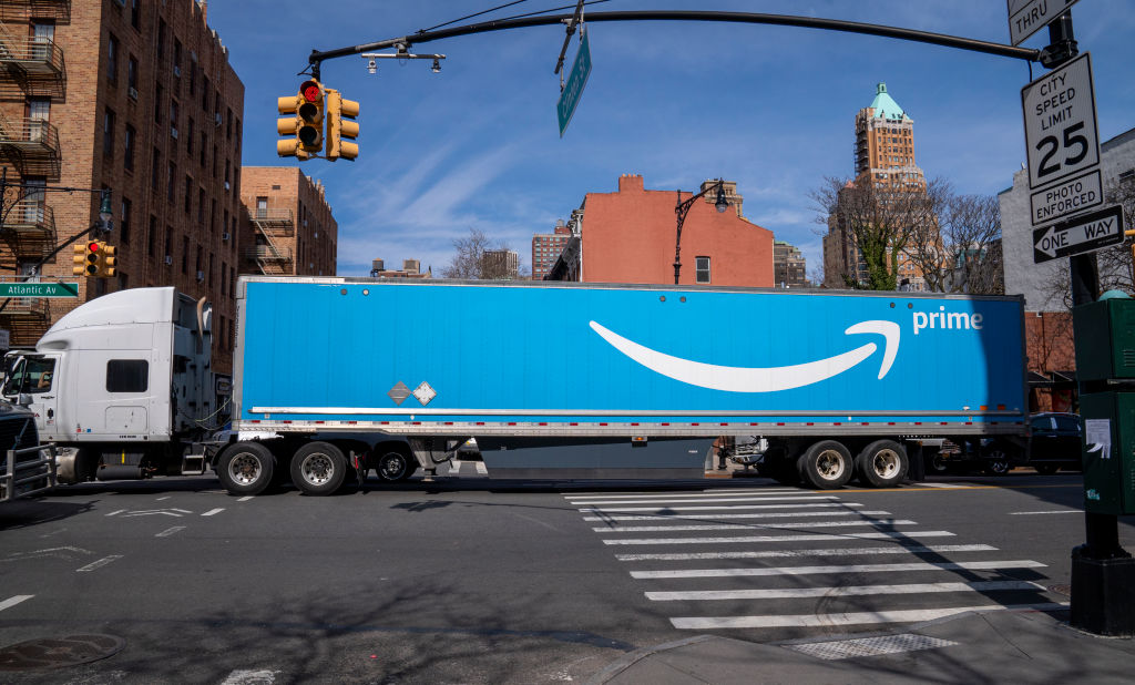 n Amazon Prime tractor-trailer carries goods through heavy traffic March 22, 2022 in the Brooklyn borough of New York City.