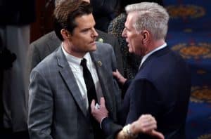 Republicans Matt Gaetz and Kevin McCarthy talk during the House Speakership votes.