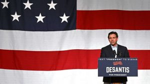Florida governor Ron DeSantis announcing his bid for the 2024 presidency in front of a big US flag.