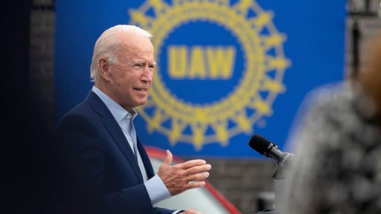 President Biden giving a speech on Friday, September 15, about the UAW strike. A UAW sign in the background.