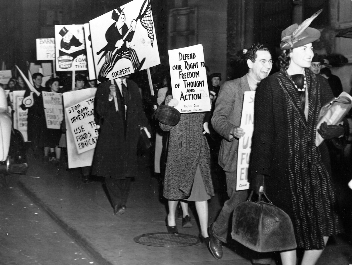 Black and white image from New York in the 1940s. Rally against the Rapp-Coudert Committee: "Defend our Right to Freedom of Thought and Action"
