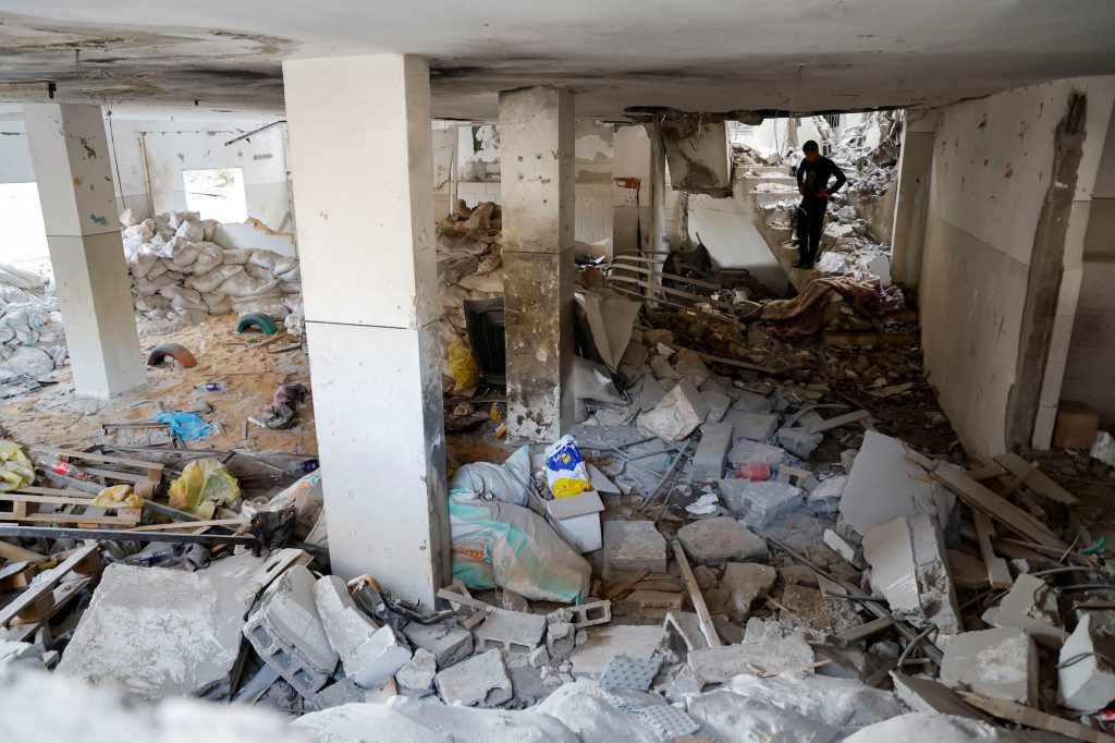 A Palestinian checks the damage at a mosque which was hit in an Israeli air strike, in Jenin refugee camp in the Israeli-occupied West Bank October 22, 2023.