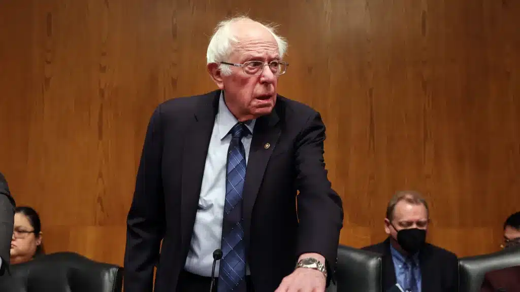 Bernie Sanders looks off to his left.