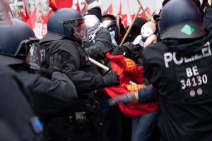 Berlin police brutalize a protester during the 105th anniversary of Rosa Luxemburg and Karl Liebknecht's death.