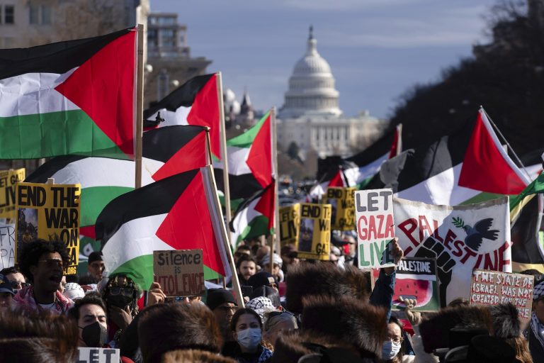With the U.S Capitol in the background, demonstrators rally during the March on Washington for Gaza at Freedom Plaza in Washington, Saturday, Jan. 13, 2024.