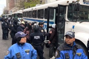 NYPD officers load Pro-Palestine protesters at Columbia onto police buses