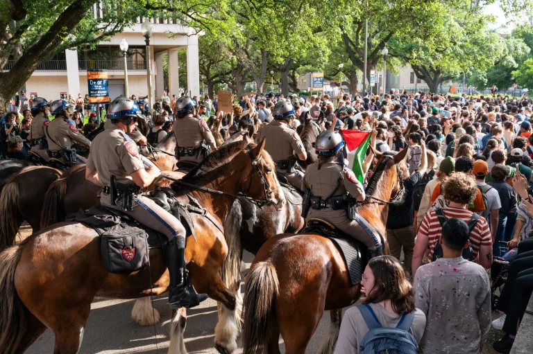 Texas State Troopers on horseback work to disperse pro-Palestinian students protesting the Israel-Hamas war on the campus of the University of Texas in Austin on Wednesday April 24.